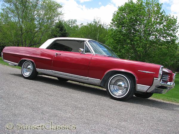 This is a beautiful red 1964 Pontiac Bonneville for sale